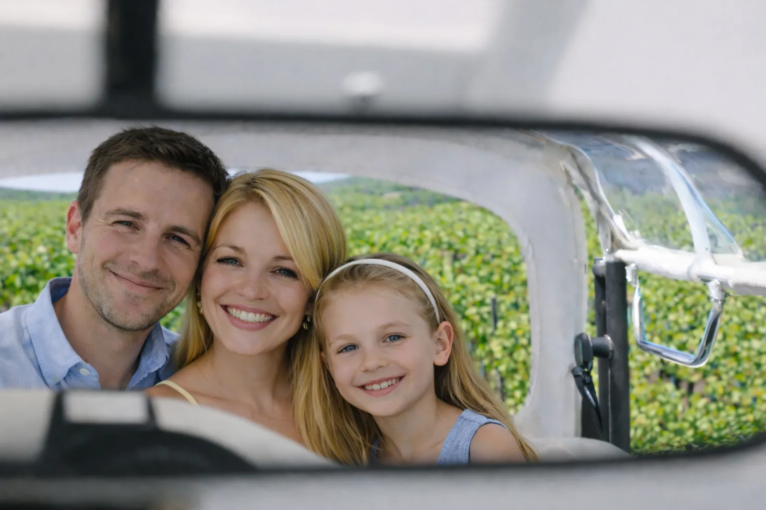 Family enjoying a tuk tuk ride in Champagne vineyards